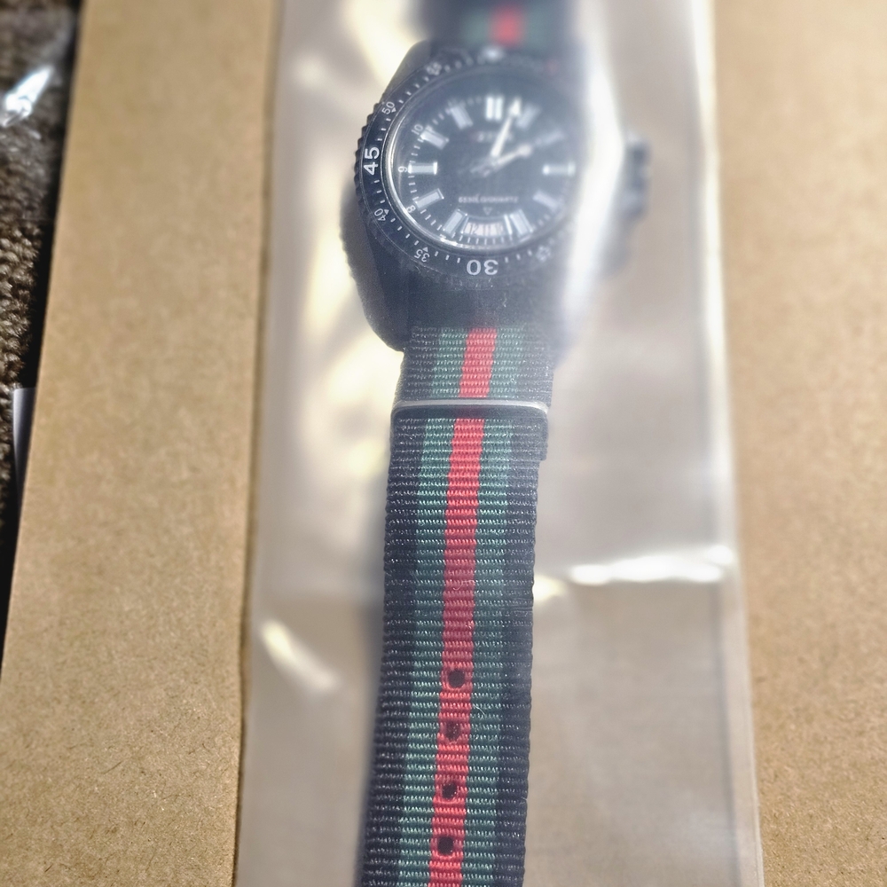 The Men's Store Black Watch with Green and Red Strap